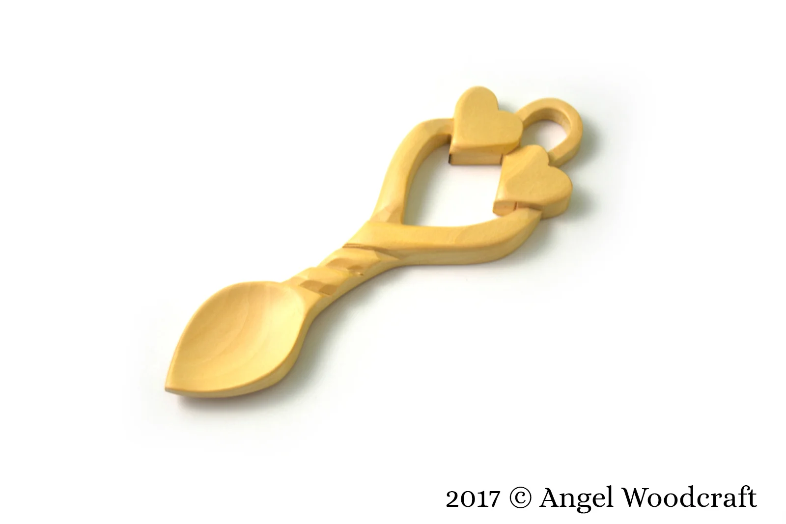 welsh love spoon rooted hearts wedding light 1