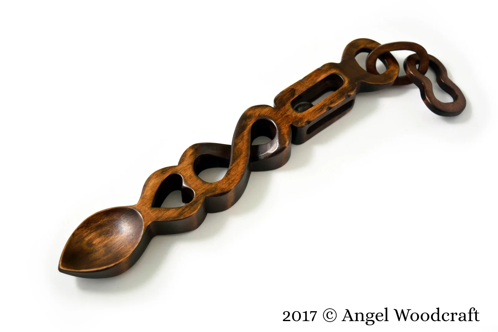 welsh love spoon balls in cage dark 1