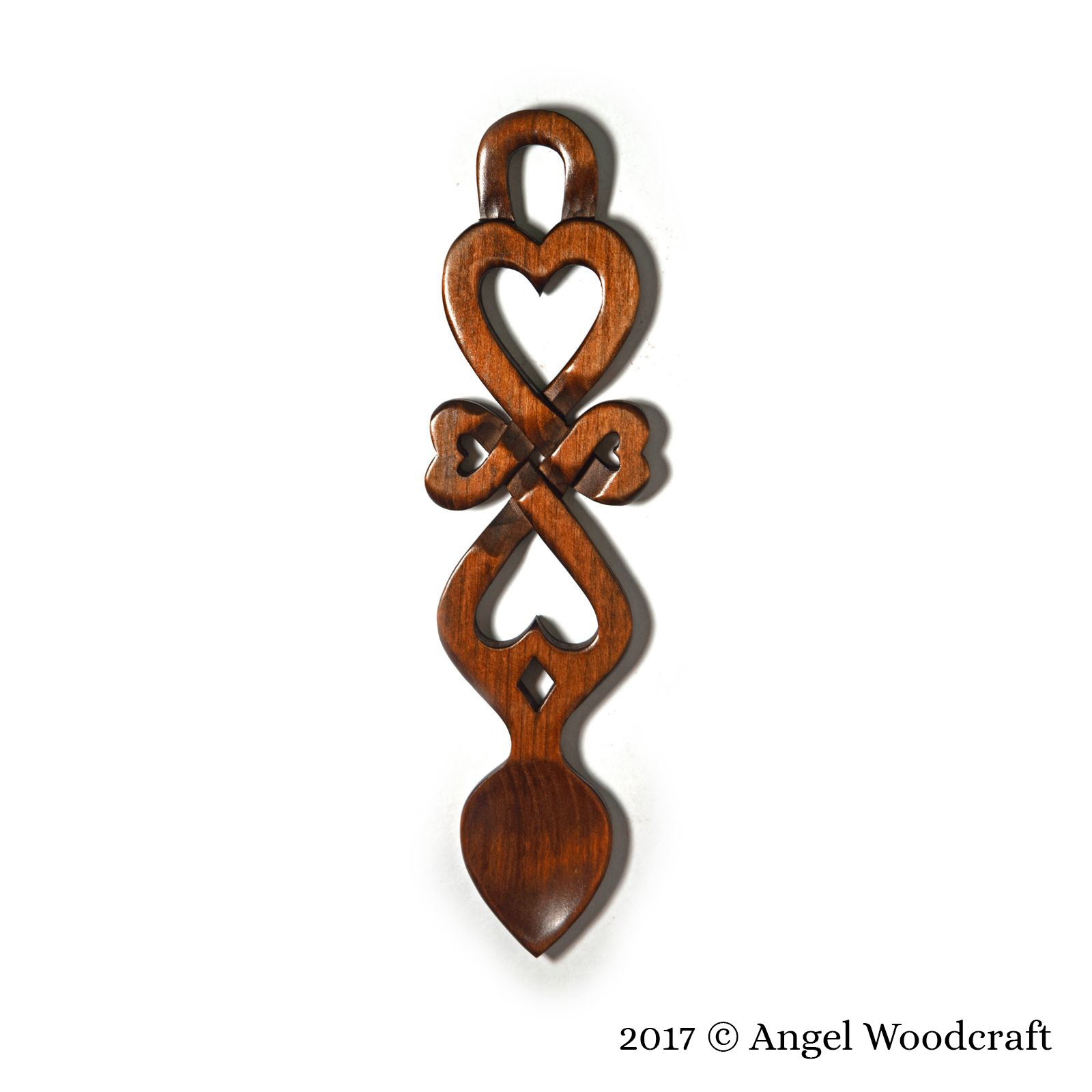 welsh love spoon hearts cross dark 2