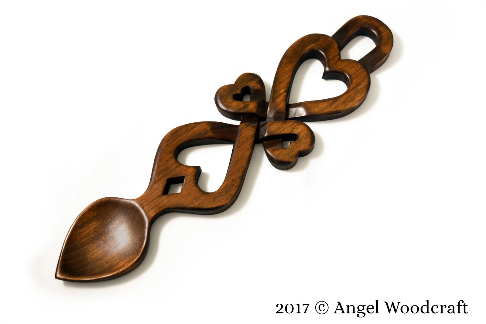 welsh love spoon hearts cross dark 1