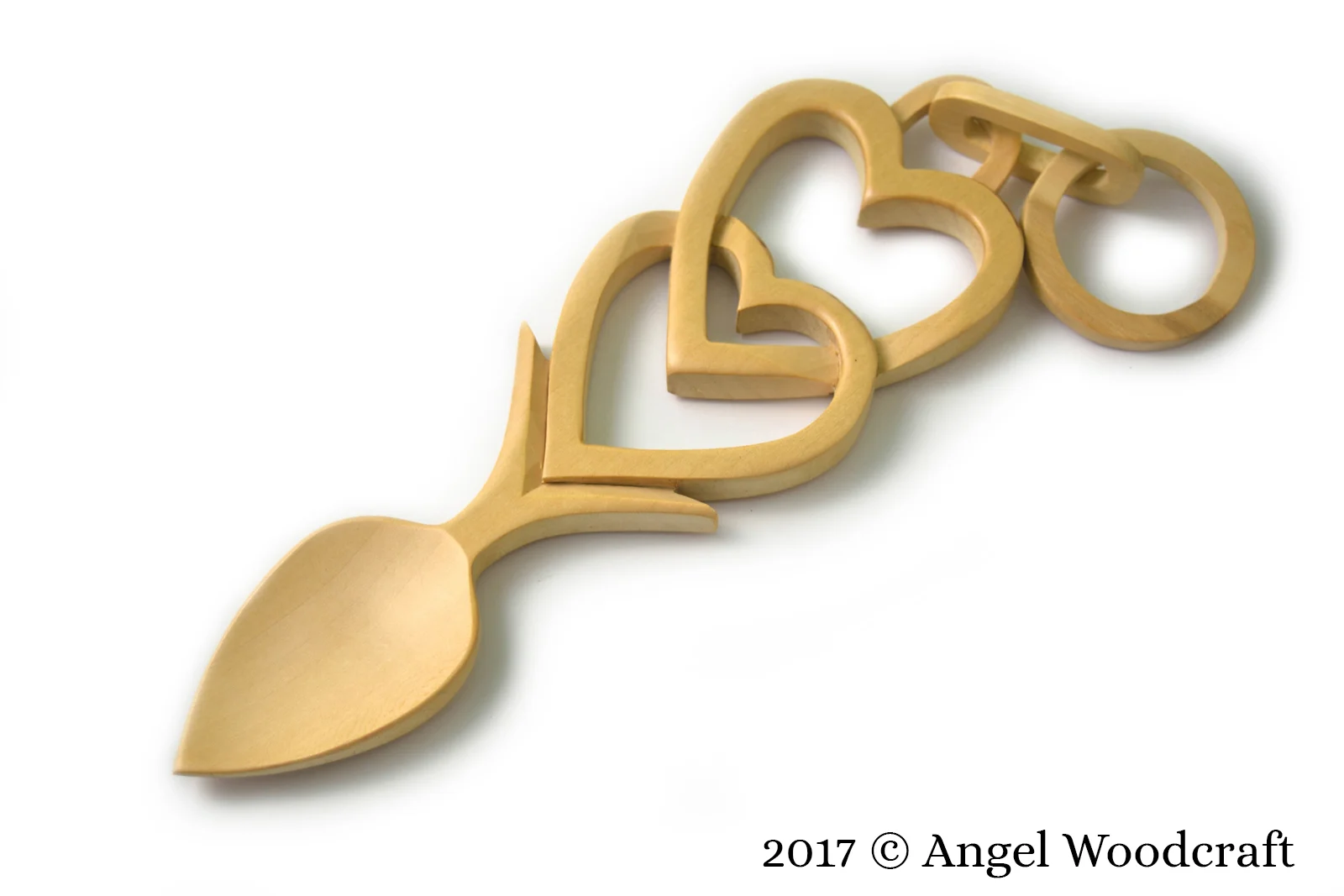 welsh love spoon two hearts and chain links light 1