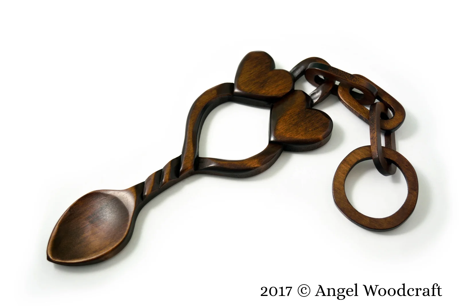 welsh love spoon two hearts linked dark 1