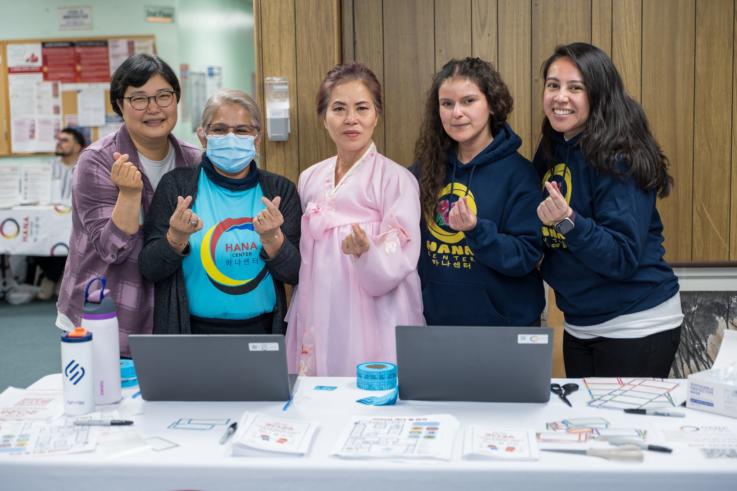  Community Navigator Yonhui Castillo (center) with HANA Center staff at Lunar New Year Celebration in 2026 