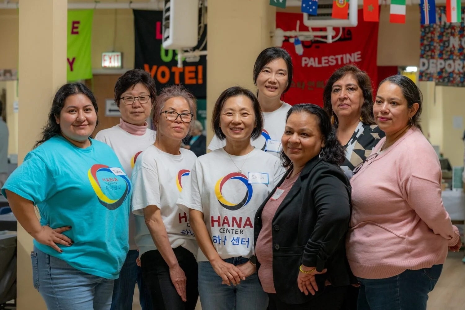  Yonhui Castillo (center left) with Spanish-speaking and Korean-speaking Community Navigators at HANA Center (Photo Credit: Borderless Magazine/Camilla Forte) 