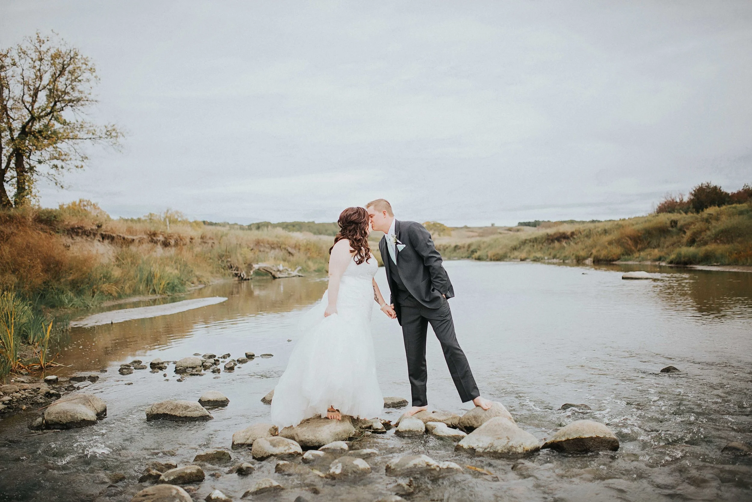 Will + Kendall pulled together an evening that had a casual and comfortable feel, but still incorporated a sense of elegance and charm by way of some very thoughtful details. I as well cannot forget to mention their sense of adventure and spirited ways when this lively couple jumped into a rolling creek to capture stunning images. 
