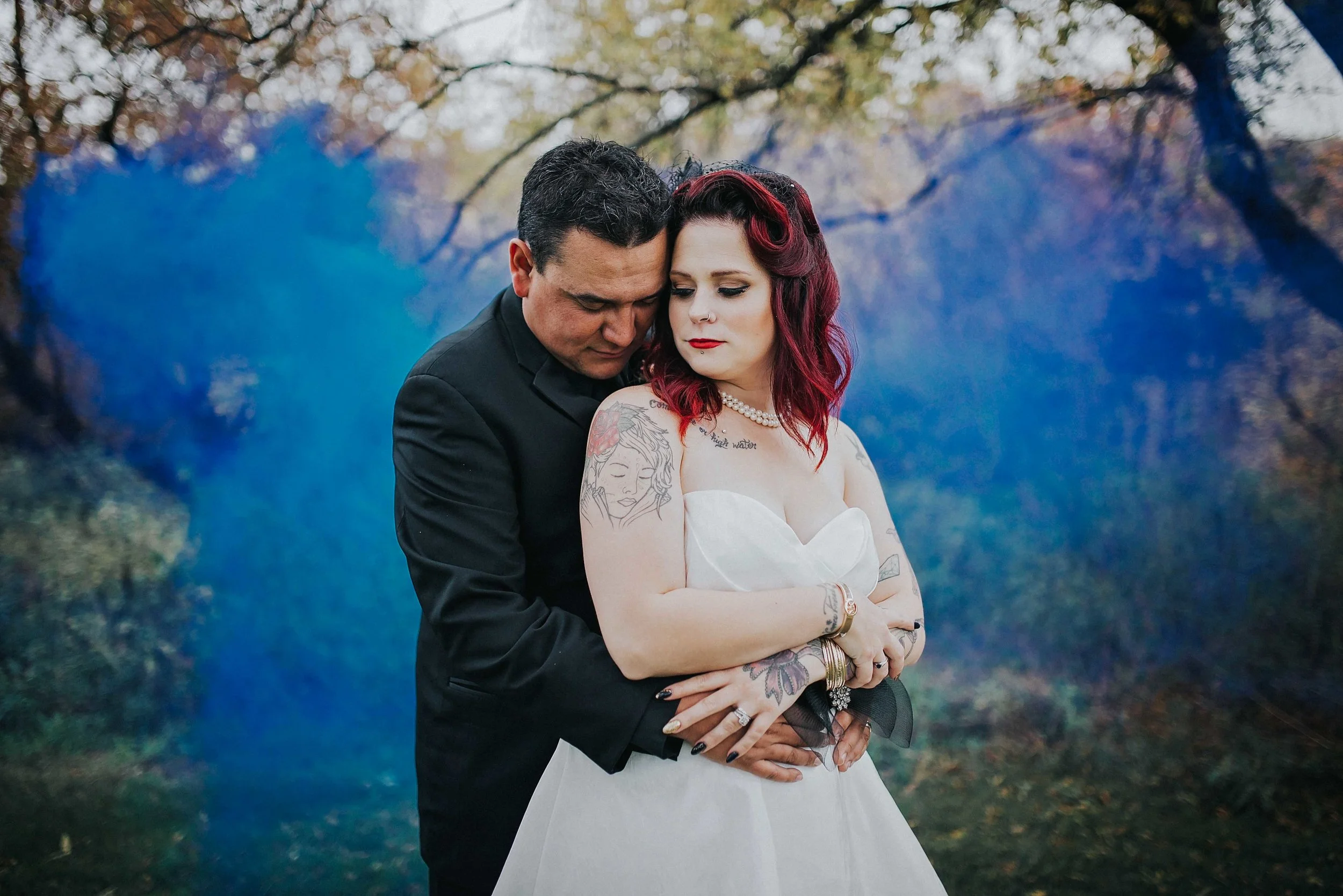 Heavy metal meets pretty in pink is how I would describe this edgy, artistic and can't forget glamorous wedding. The fine details of the entire day is one that you won't forget. Paul + Brandy thought every detail out to represent all the goods they loved. The skulls in the bouquet, the guitar picks as wedding favours, the elaborate decor and the endless amounts of colour throughout the day. This was one smokin' wedding celebration! 