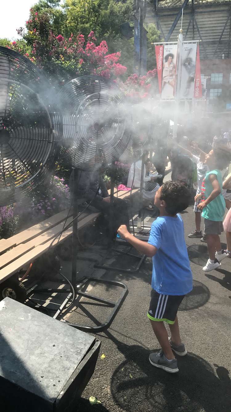 US Open - Ashe Day - Spray Fans