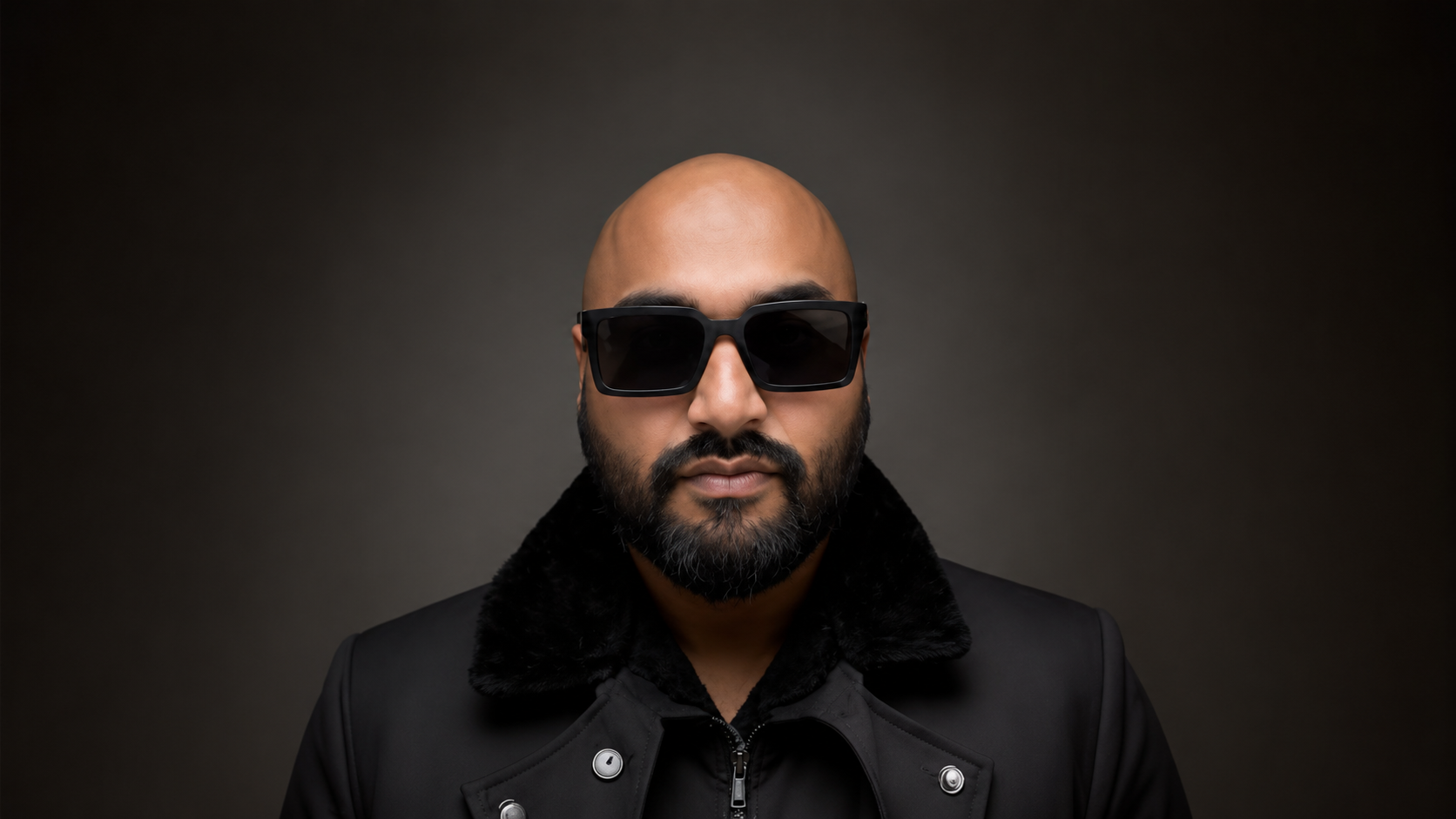 DJ Vik Gujral of Sound Nation, professional South Asian wedding DJ, music producer, and live dhol performer for weddings and special events.