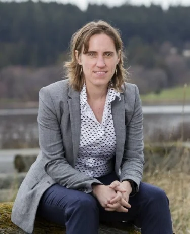 Dr. Kristin Morell in the Esquimalt Lagoon which the Leech River Fault runs adjacent. Photo: UVic Photo Services.