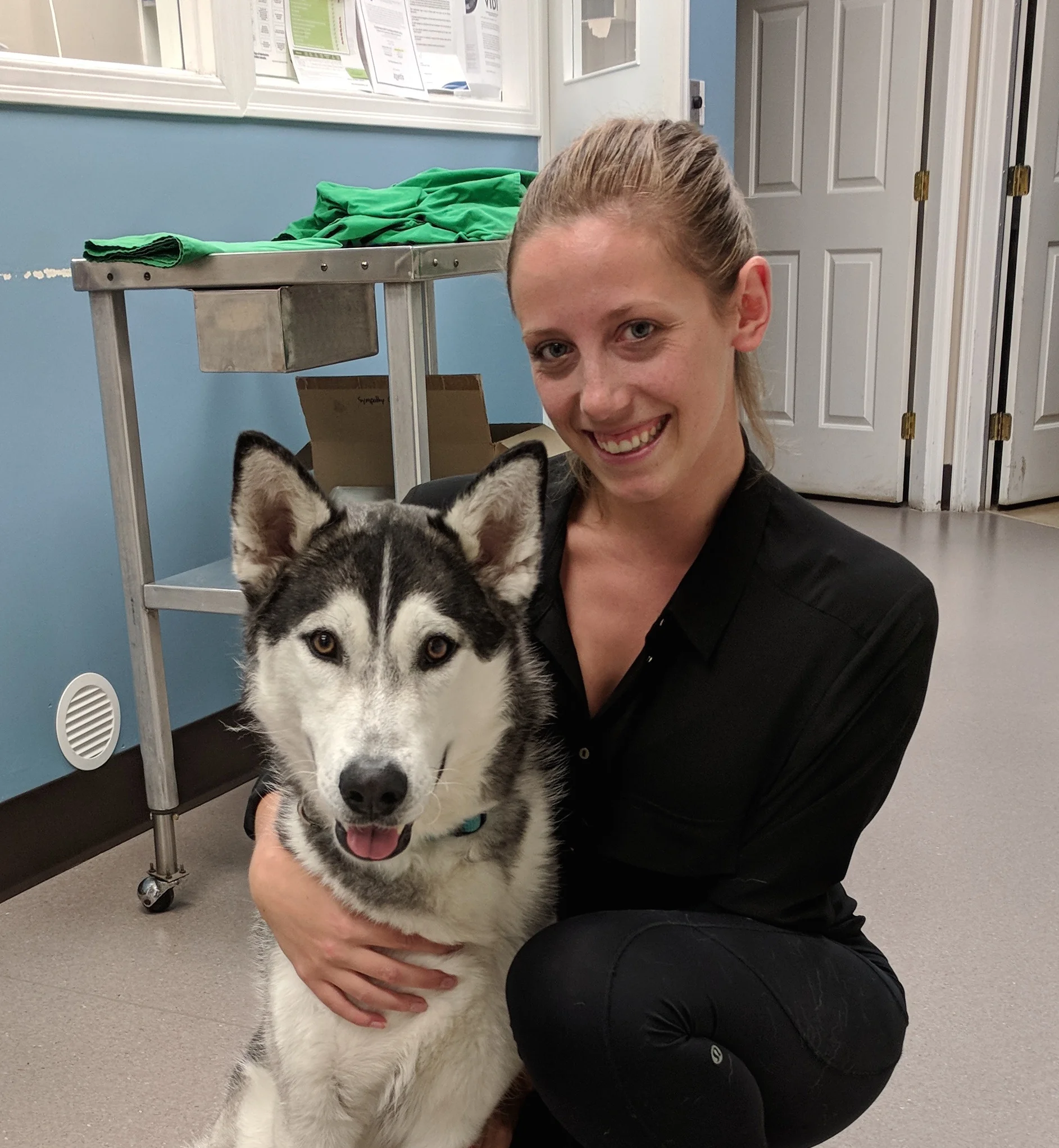 Dr. Friesen and her dog, Indy at the Sidney Animal Hospital.