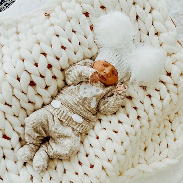 Oh my goodness can you get over the sweetness?  Our new white baby blanket is in stock right now!!! Thank you so much for the adorable picture @withlovenatalya.  #merinowoolbabyblanket #chuckyknitblanket #merinobaby #babyfever #babyshower #fineyarns