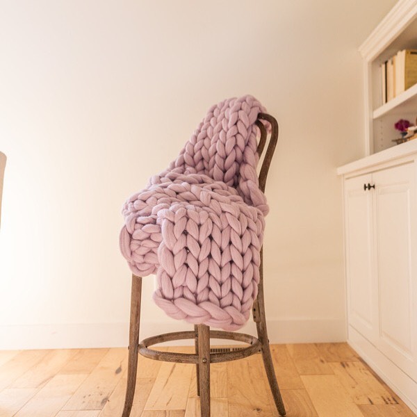 Our biggest sale of the year is coming up this Friday along with 100 other small shops. This is our lilac bloom chunky  knit which always draws attention in a room!  #nordstrom #nordstromslc #chunkyknitblanket #chunkyblanket #merinowoolblanket #lanea