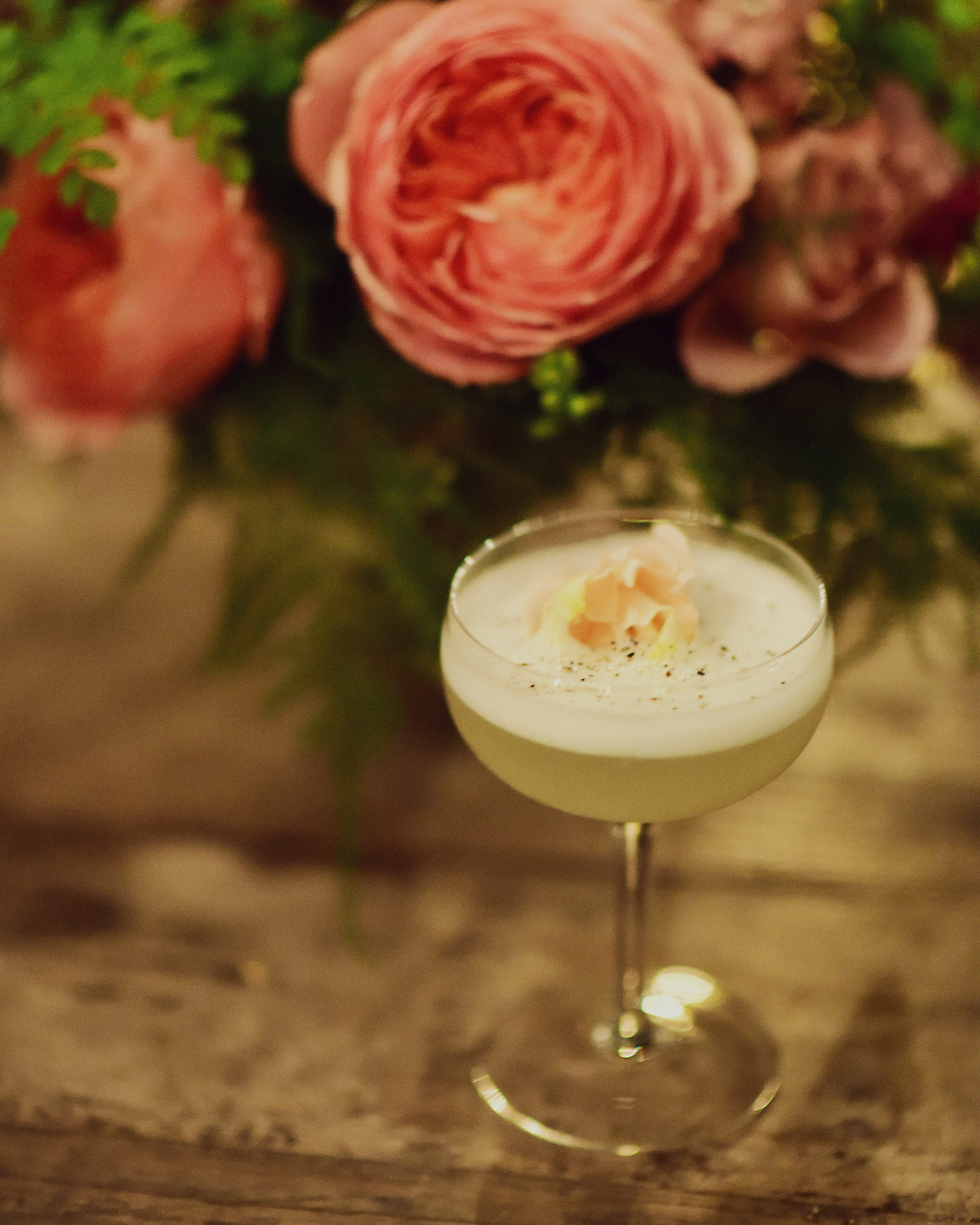 THE SHOWGIRL fresh pressed pineapple and lime, house rose syrup, cracked black pepper, vodka