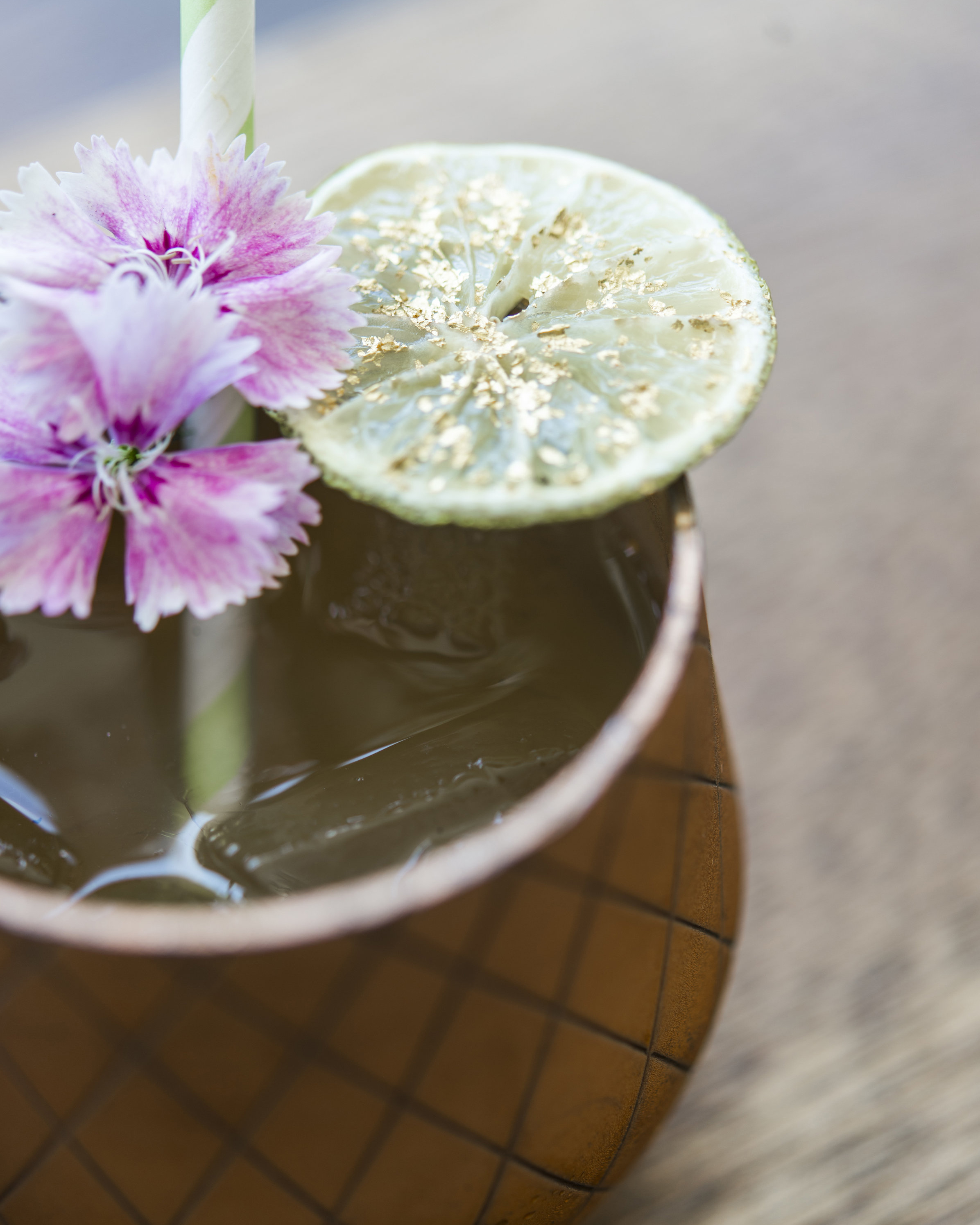 ROAD TO HANA fresh pressed pineapple and lime, lilikoi, kaffir lime, vodka