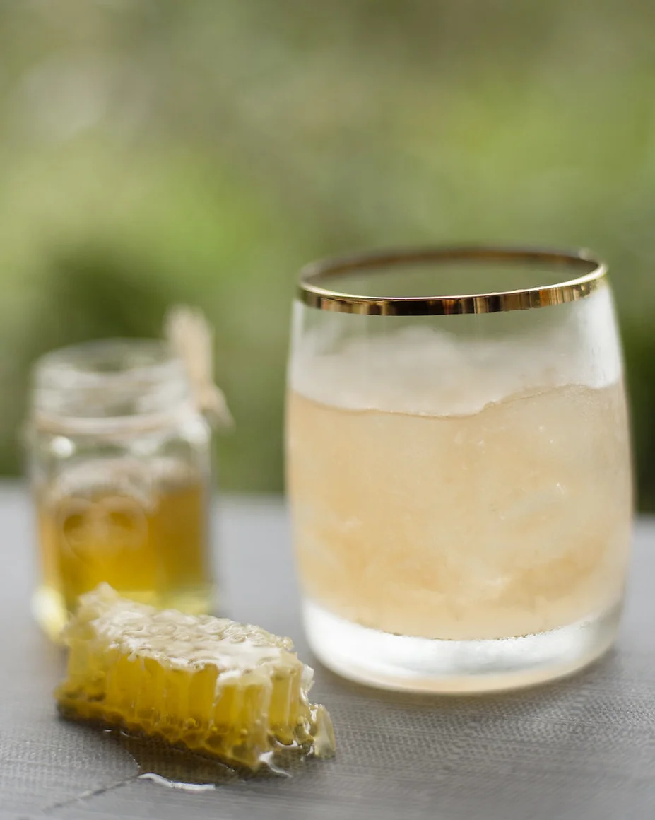 HONEY BADGER fresh pressed lemon, honeycomb, black walnut bitters, house lemon soda, scotch