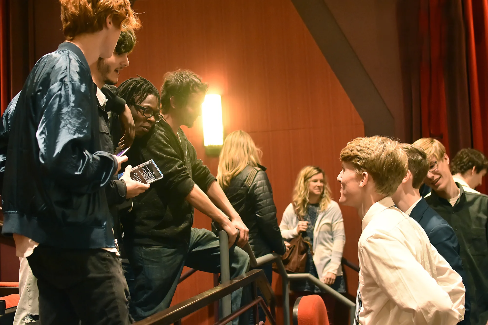 Andrew Holt and the Third Place team from Rake talk to Travis Kyker and Caleb Eells of Society .