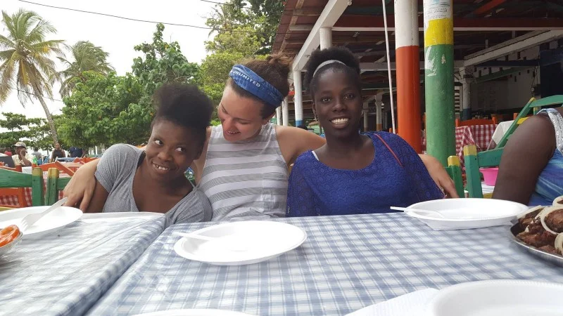 Nancy, Courtney, and Dailove (left to right) at our special dinner at the beach to recognize our pen pals and their Fi Ki Fò program teachers.