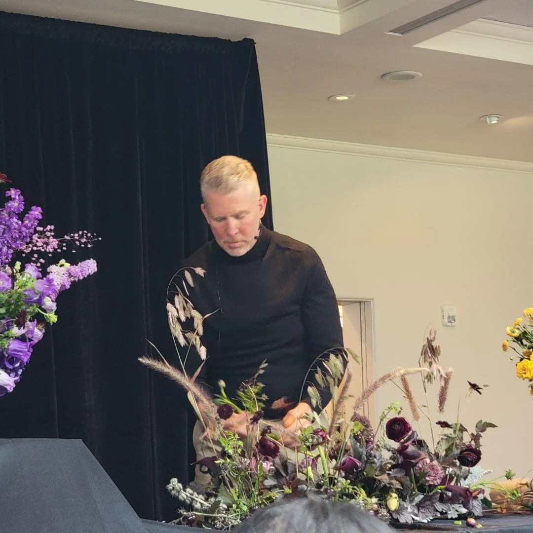 john creating long skinny floral.jpg