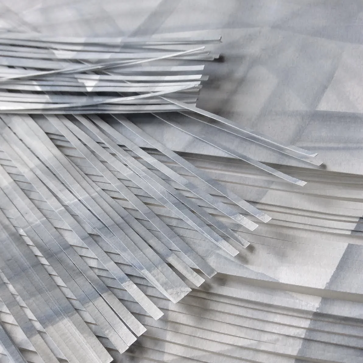 Preparing components for a large-scale paper model. Paper and paint, 2017.