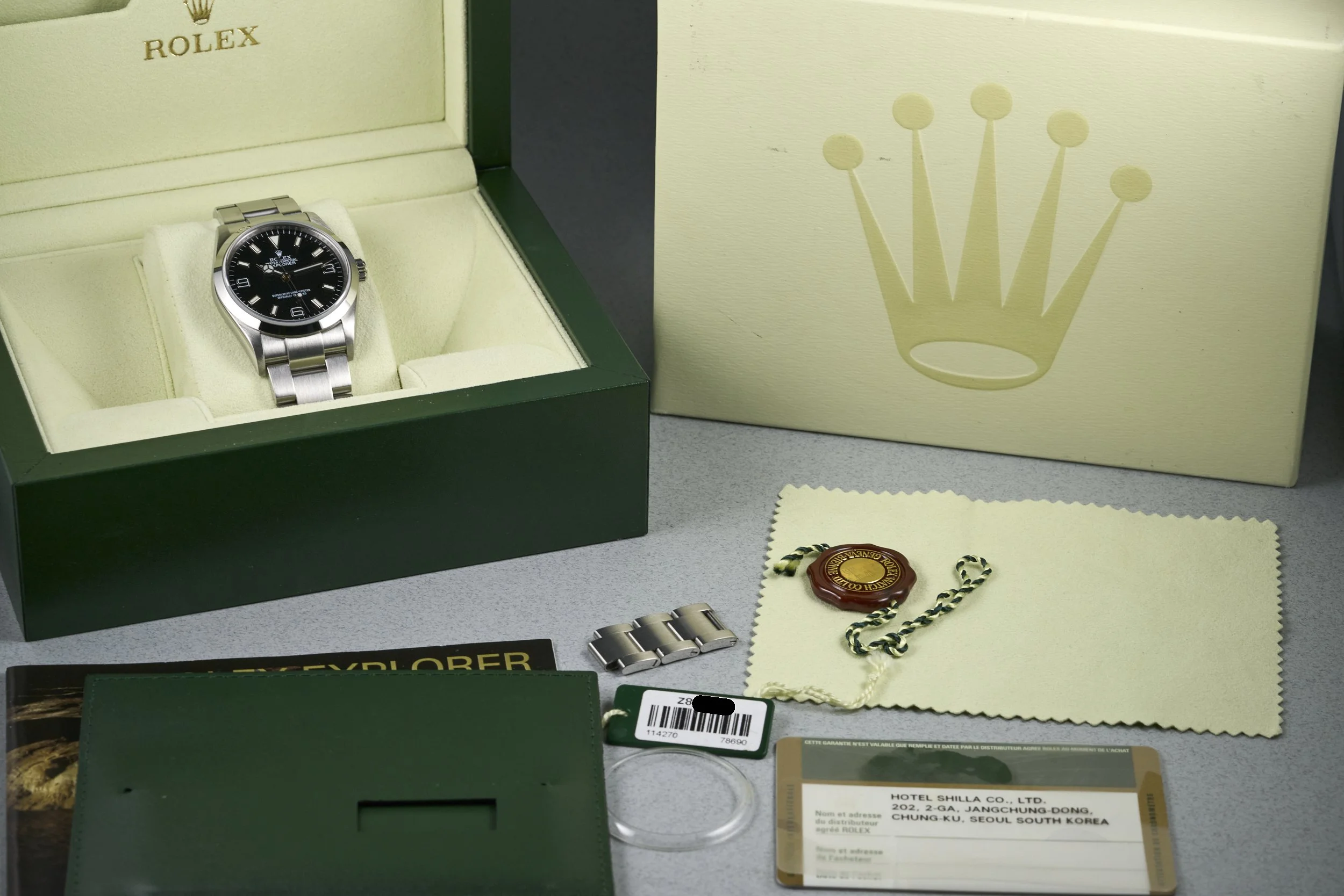 rolex-explorer.boxpapers-114270-black.dial-2006.Z-oysterpalace-OP2209-11.jpg