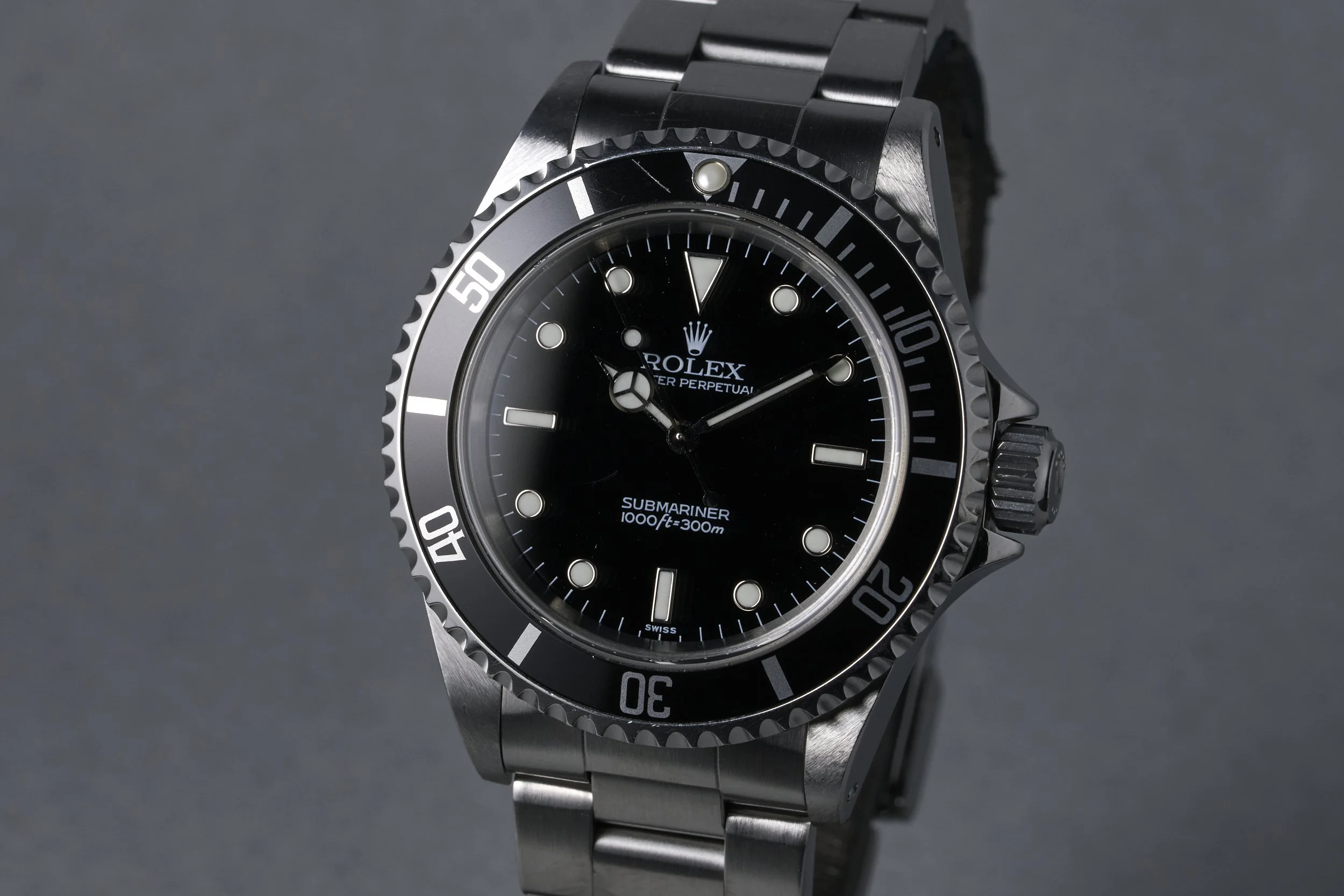 rolex-submariner-14060-swiss.only.dial-1999-oysterpalace-OP2287-03.jpg