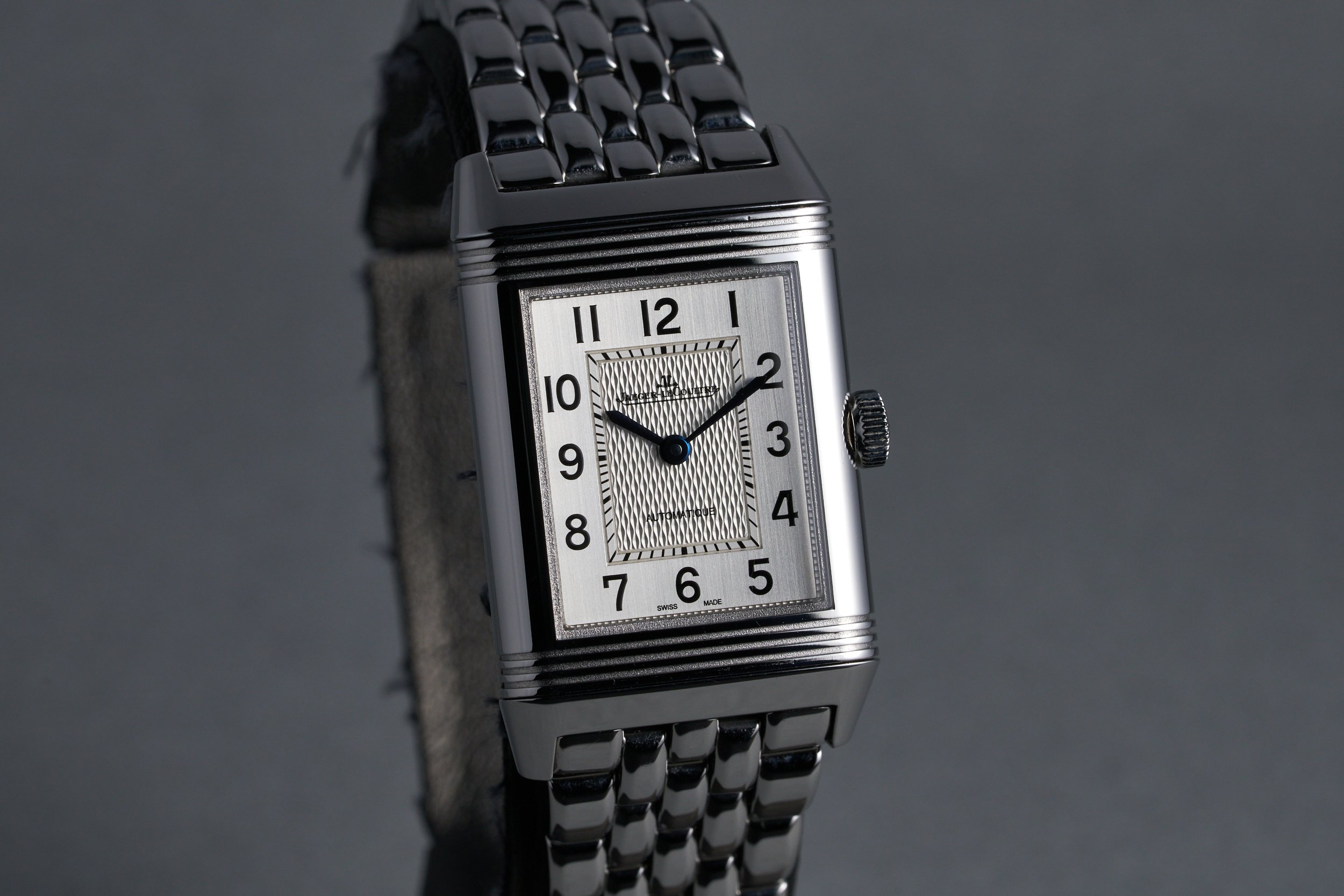 jaegerlecoultre-reverso.medium.boxpapers-212.8.S5-silver.arabic.dial-3.2mill-oysterpalace-OP1581-02.jpg
