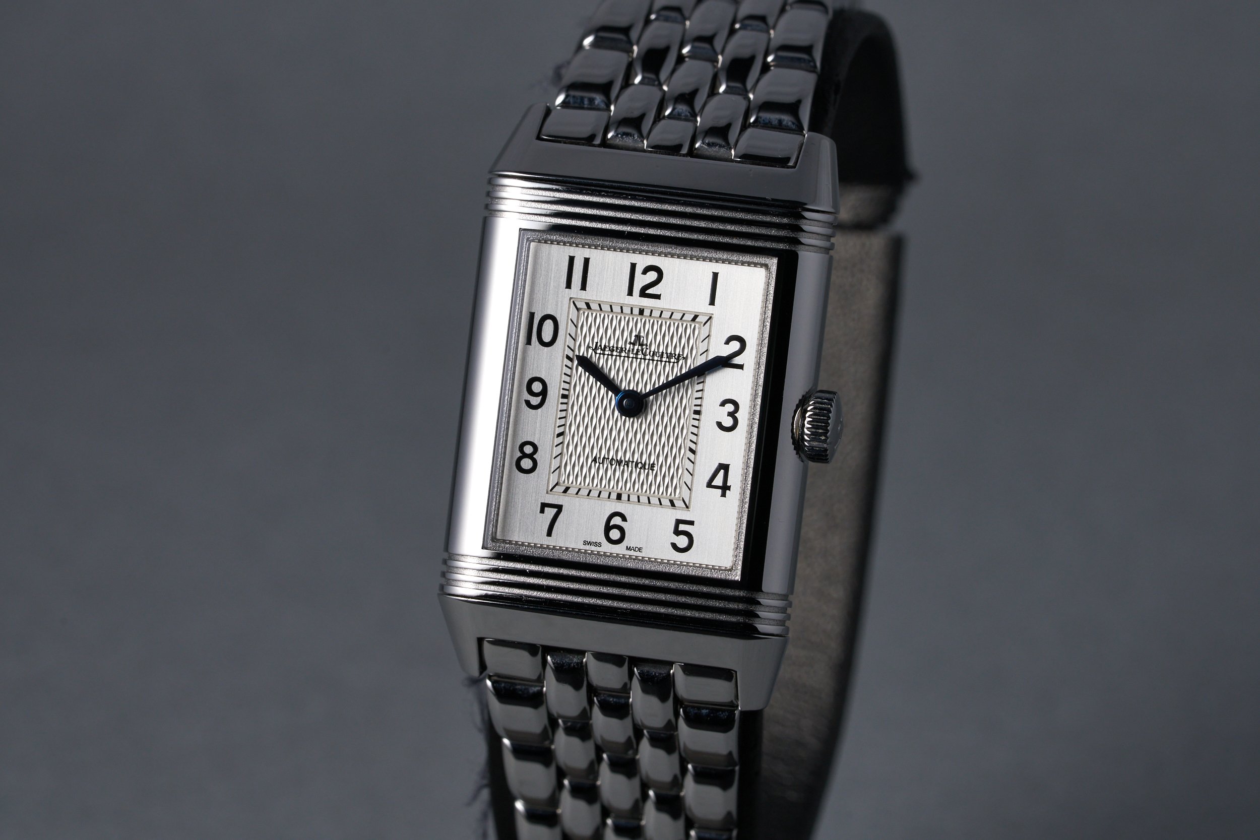 jaegerlecoultre-reverso.medium.boxpapers-212.8.S5-silver.arabic.dial-3.2mill-oysterpalace-OP1581-03.jpg