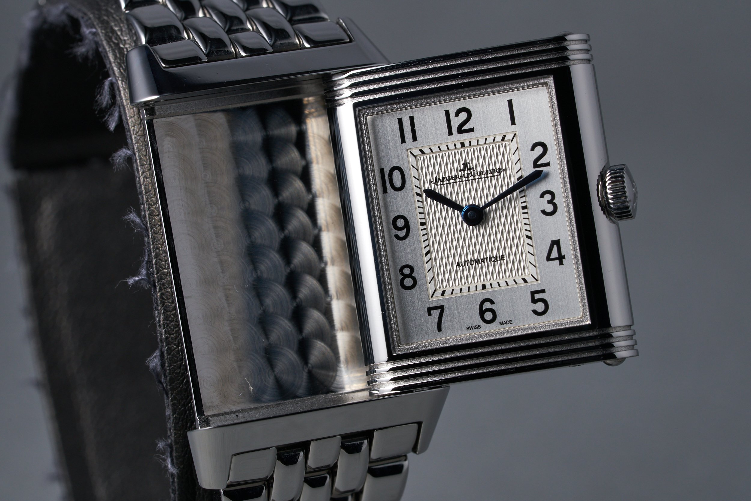 jaegerlecoultre-reverso.medium.boxpapers-212.8.S5-silver.arabic.dial-3.2mill-oysterpalace-OP1581-06.jpg
