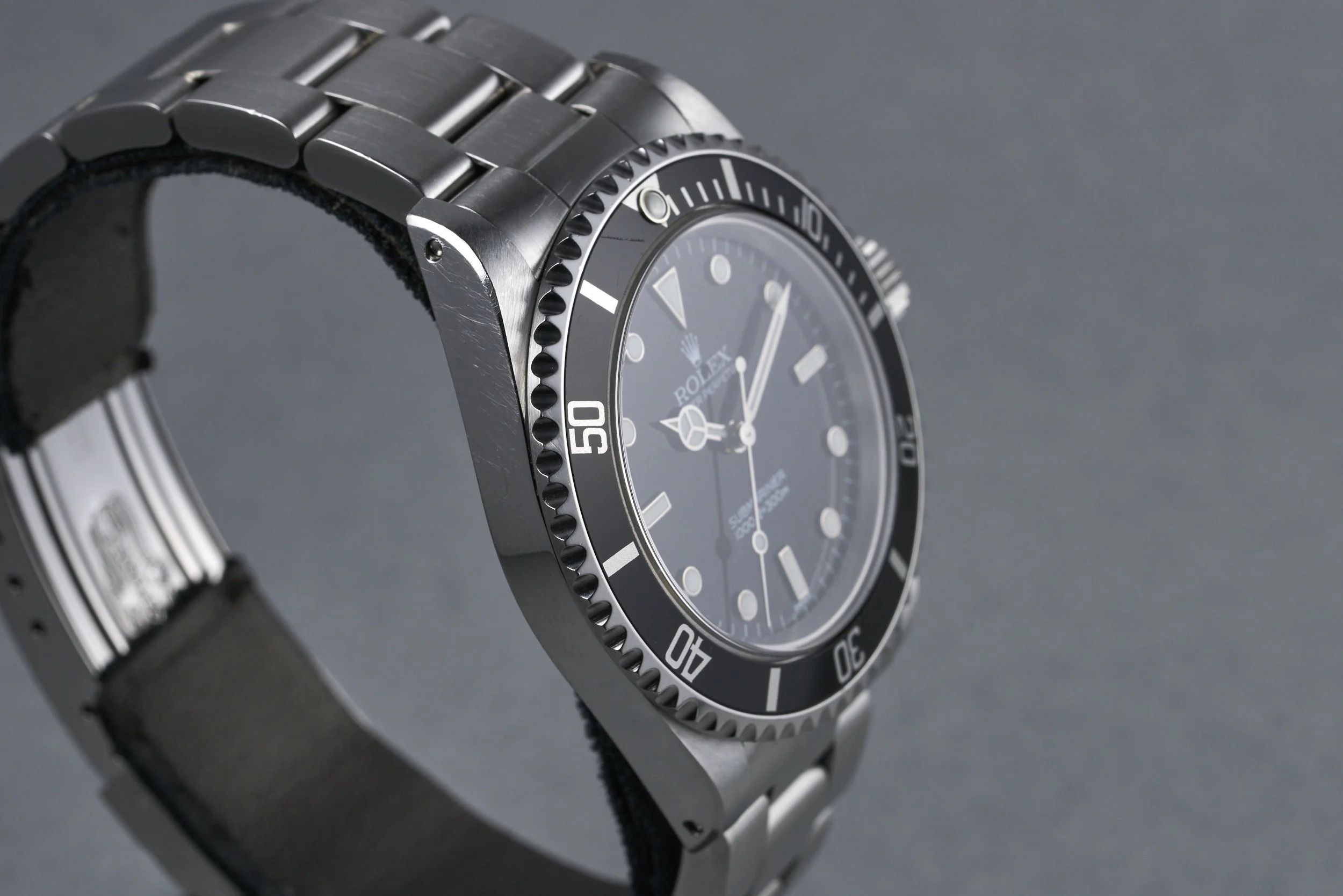 rolex-submariner-14060-swiss.only.dial-1999-oysterpalace-OP2287-05.jpg