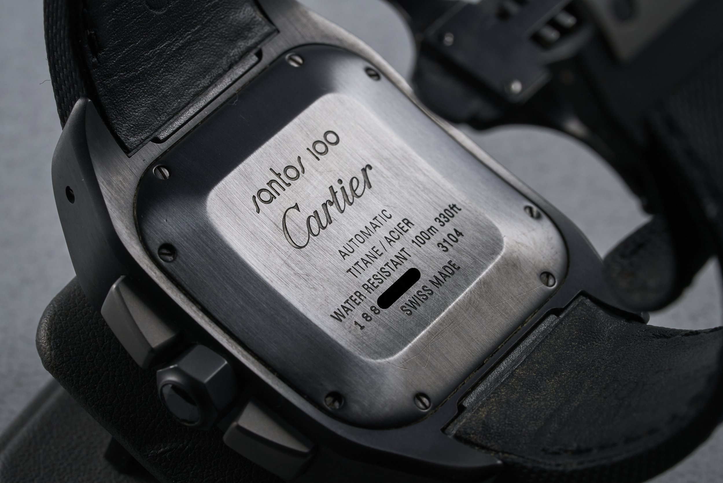 cartier-santos100.XL.box-W2020005-black.dial-2010-oysterpalace-OP2333-08.jpg