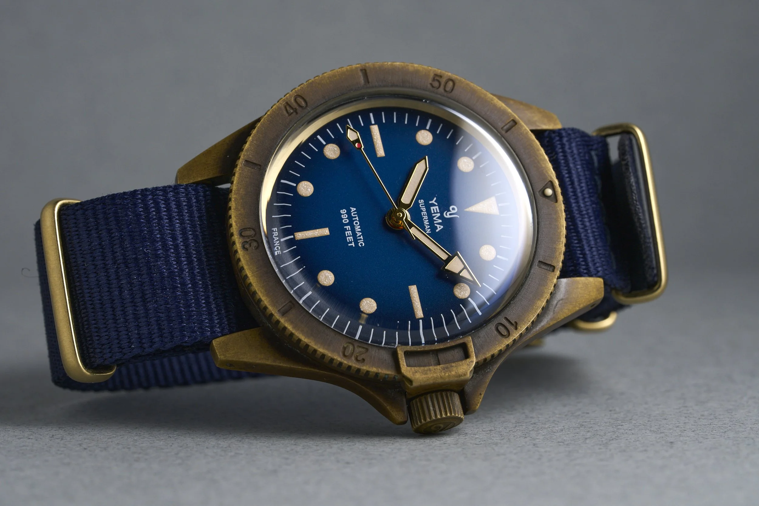 yema-superman.bronze.boxpapers-ysupz-blue.dial-2010-oysterpalace-OP2327-10.jpg