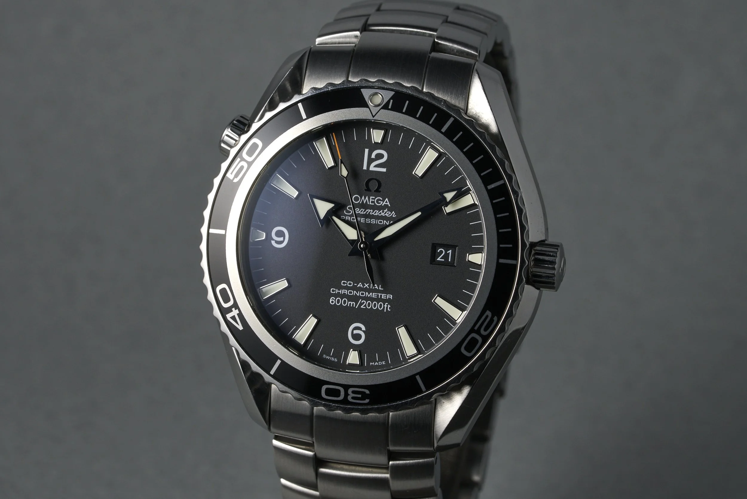 omega-seamaster.planet.ocean.boxpapers-2200.50-black.dial-2011-oysterpalace-OP2264-03.jpg