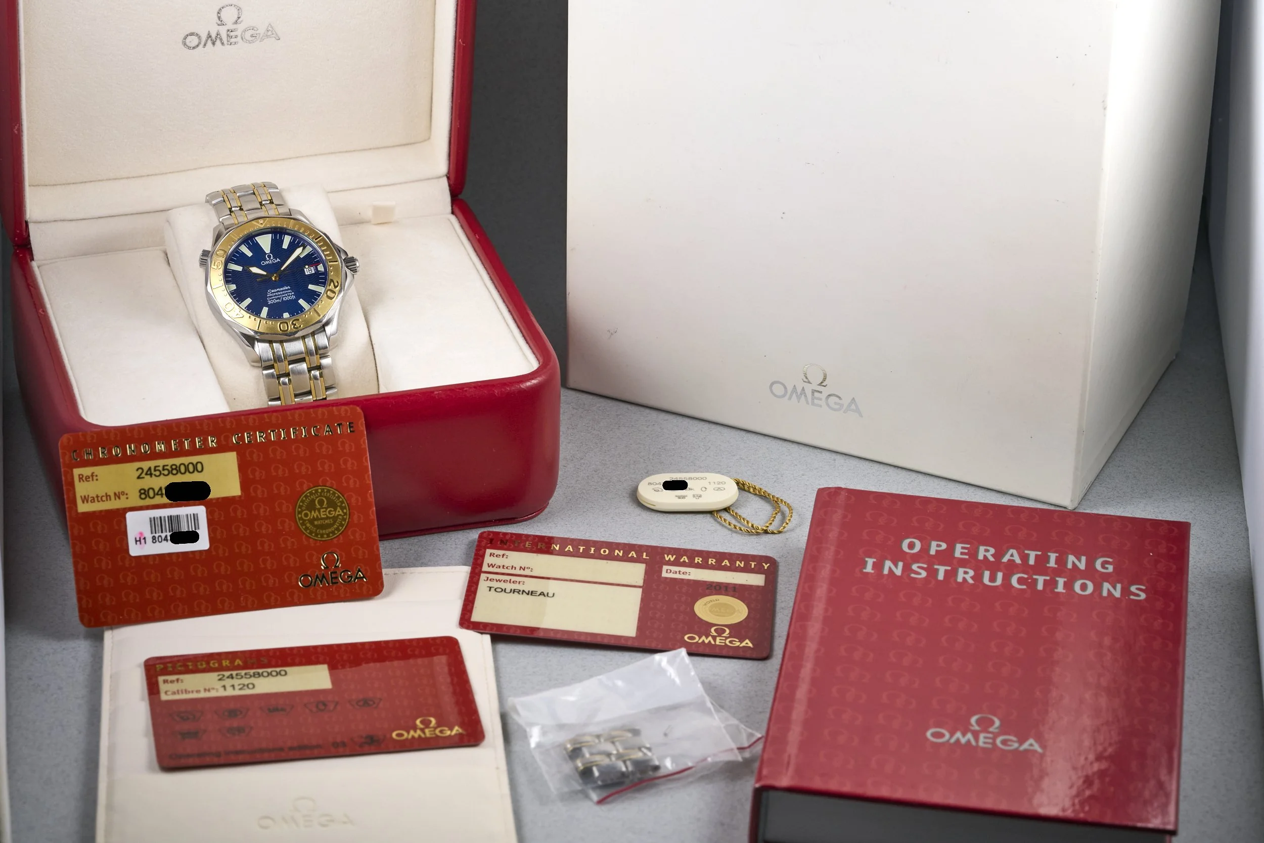omega-seamaster.twotone.boxpapers-2455.80-blue.wave.dial-2000s-oysterpalace-OP2336-10.jpg