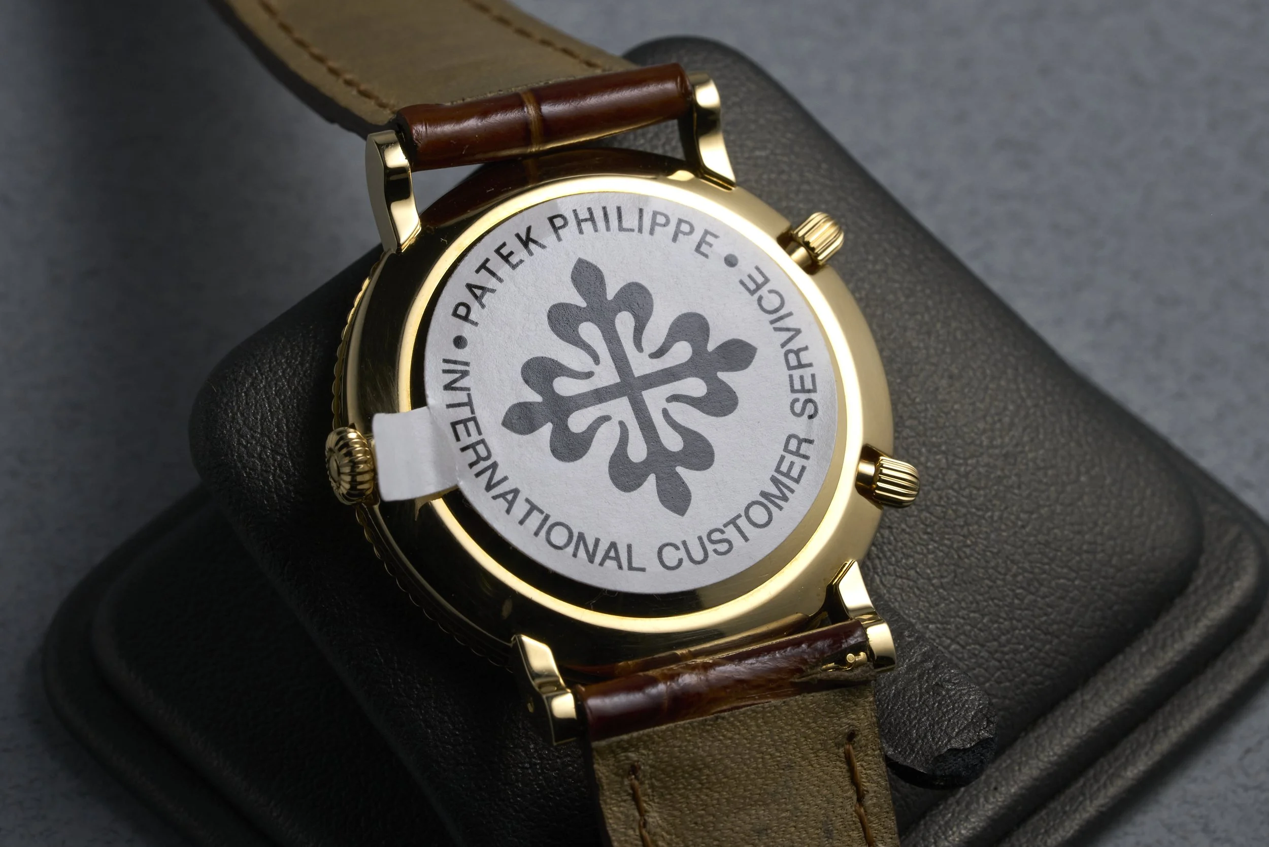patekphilippe-traveltime.yellowgold.servicepapers-5034-white.roman.dial-2000s-oysterpalace-OP2207-10.jpg