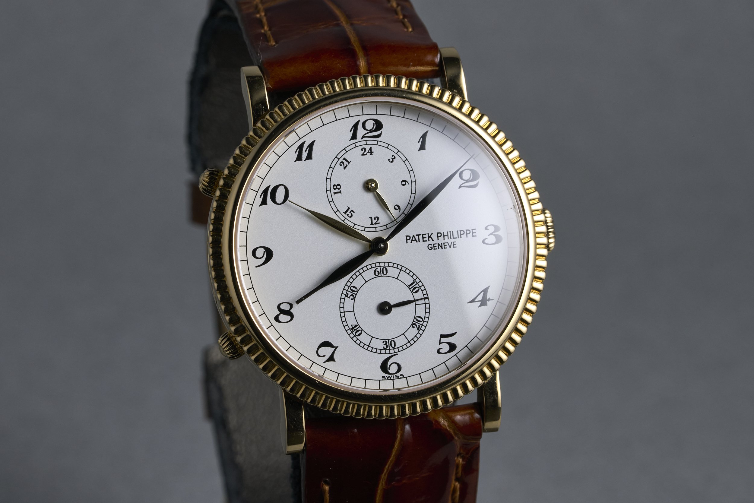patekphilippe-traveltime.yellowgold.servicepapers-5034-white.roman.dial-2000s-oysterpalace-OP2207-02.jpg