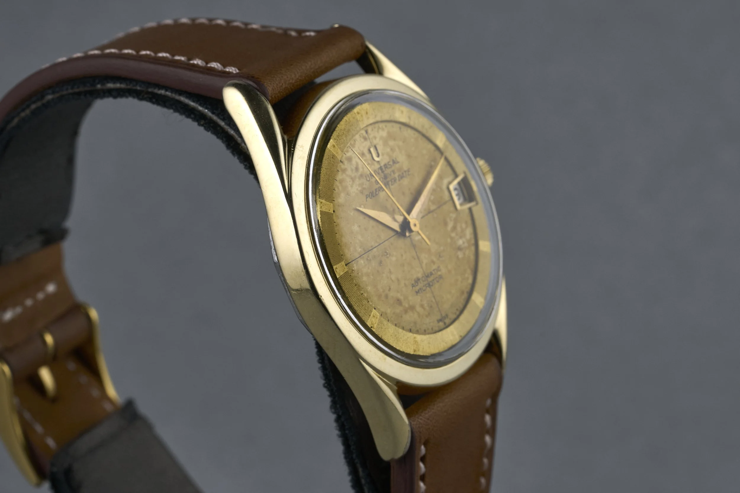 universalgeneve-polerouter.date.goldcap-204504.4-champagne.dial-1950s-oysterpalace-OP2195-06.jpg