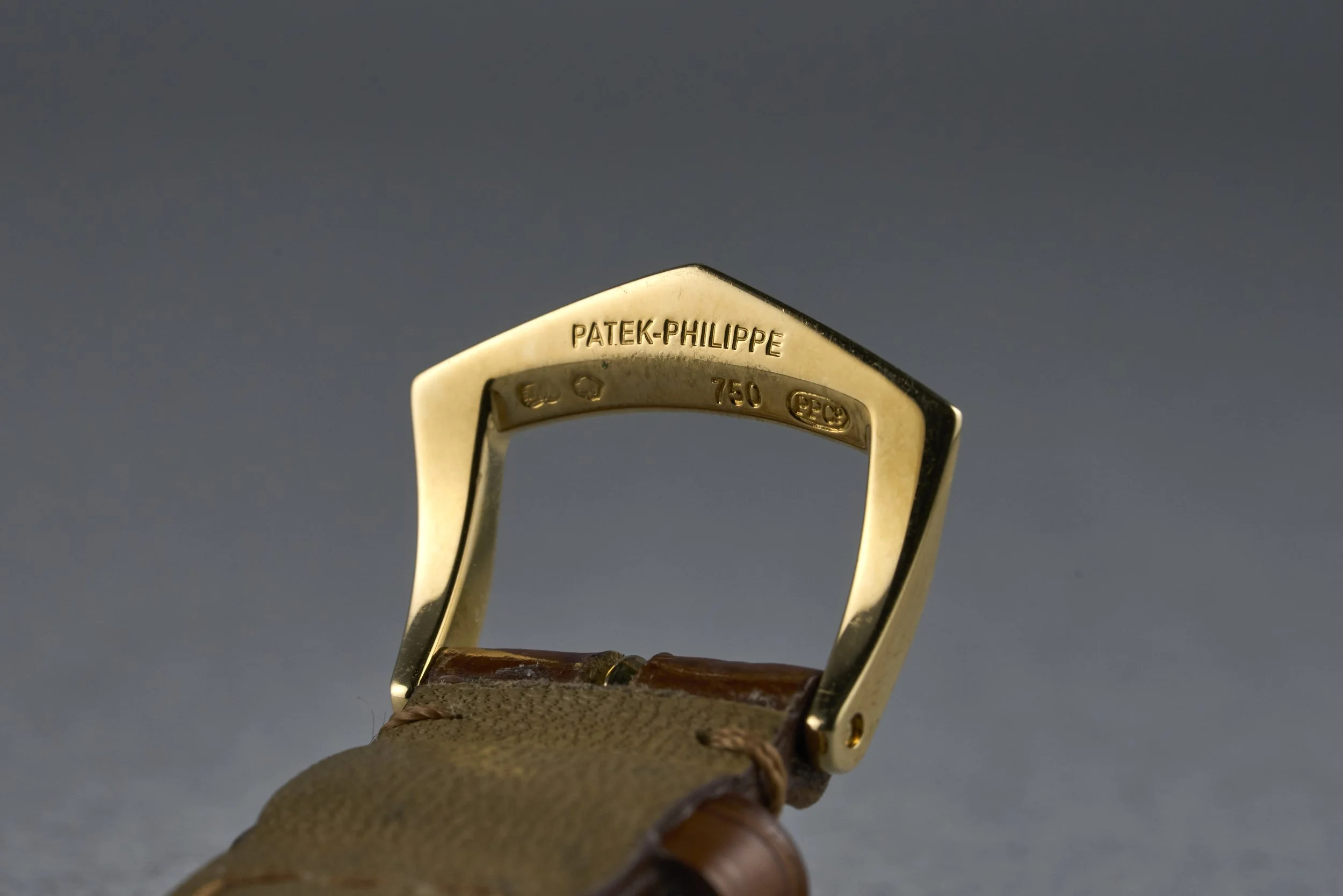 patekphilippe-traveltime.yellowgold.servicepapers-5034-white.roman.dial-2000s-oysterpalace-OP2207-09.jpg