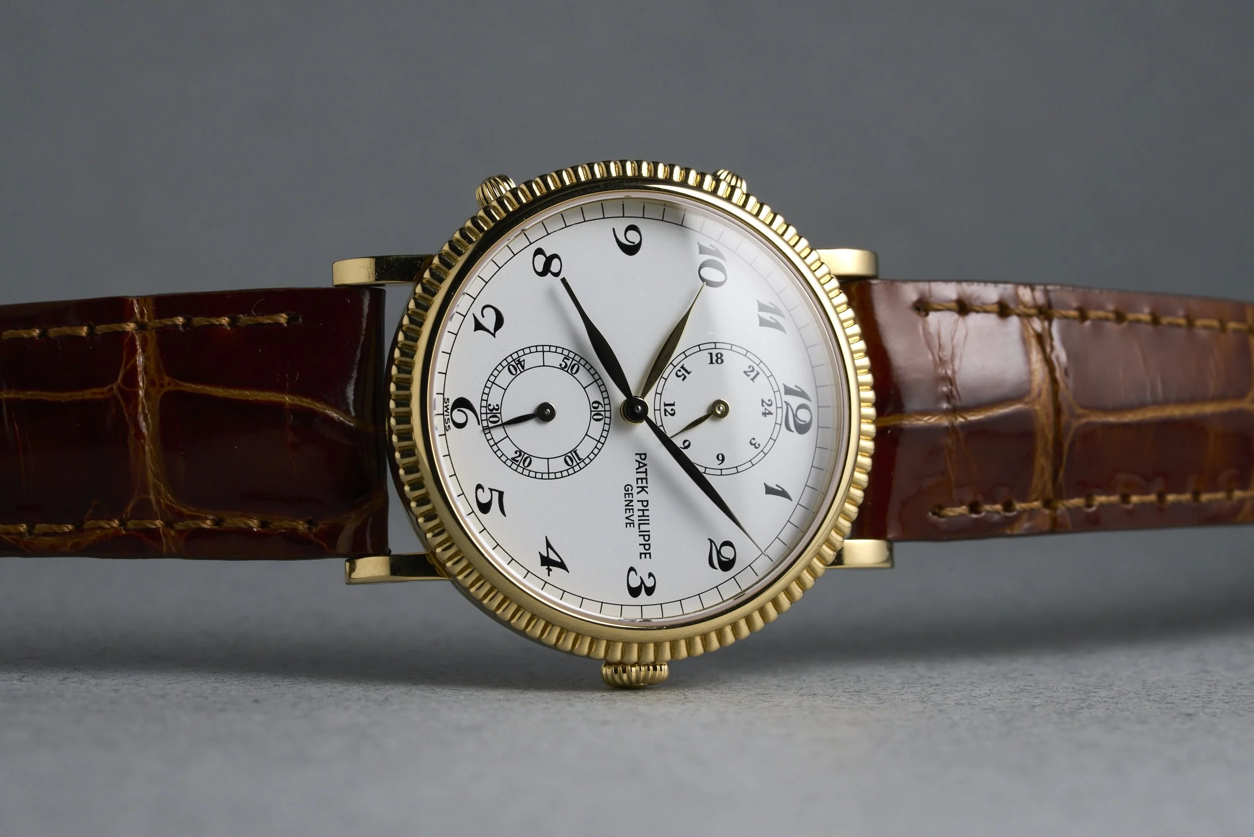 patekphilippe-traveltime.yellowgold.servicepapers-5034-white.roman.dial-2000s-oysterpalace-OP2207-14.jpg