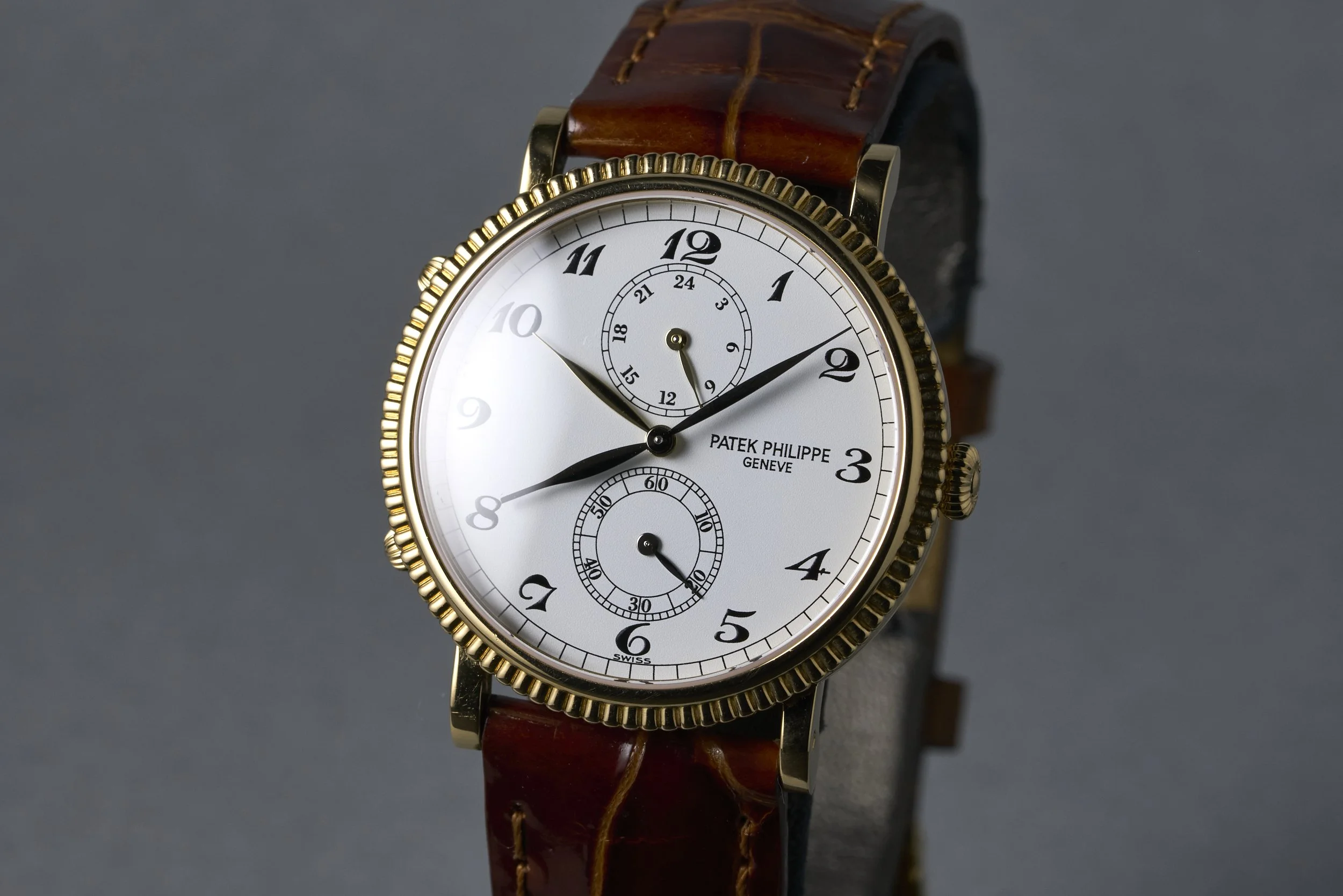 patekphilippe-traveltime.yellowgold.servicepapers-5034-white.roman.dial-2000s-oysterpalace-OP2207-03.jpg