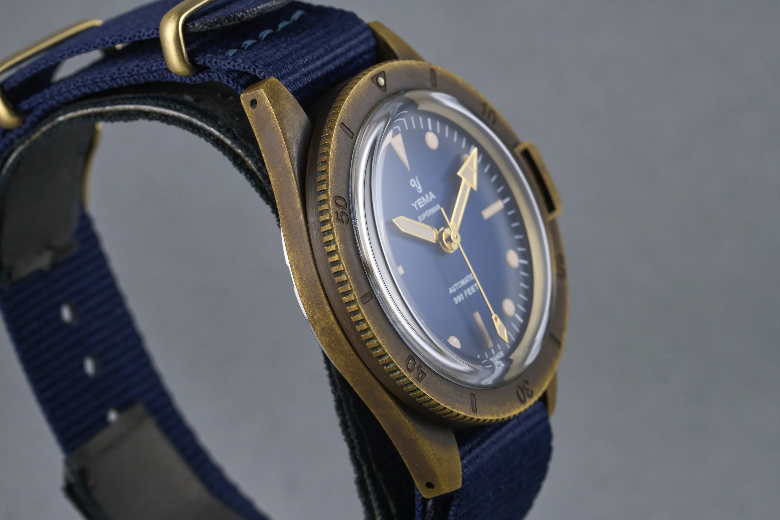 yema-superman.bronze.boxpapers-ysupz-blue.dial-2010-oysterpalace-OP2327-05.jpg