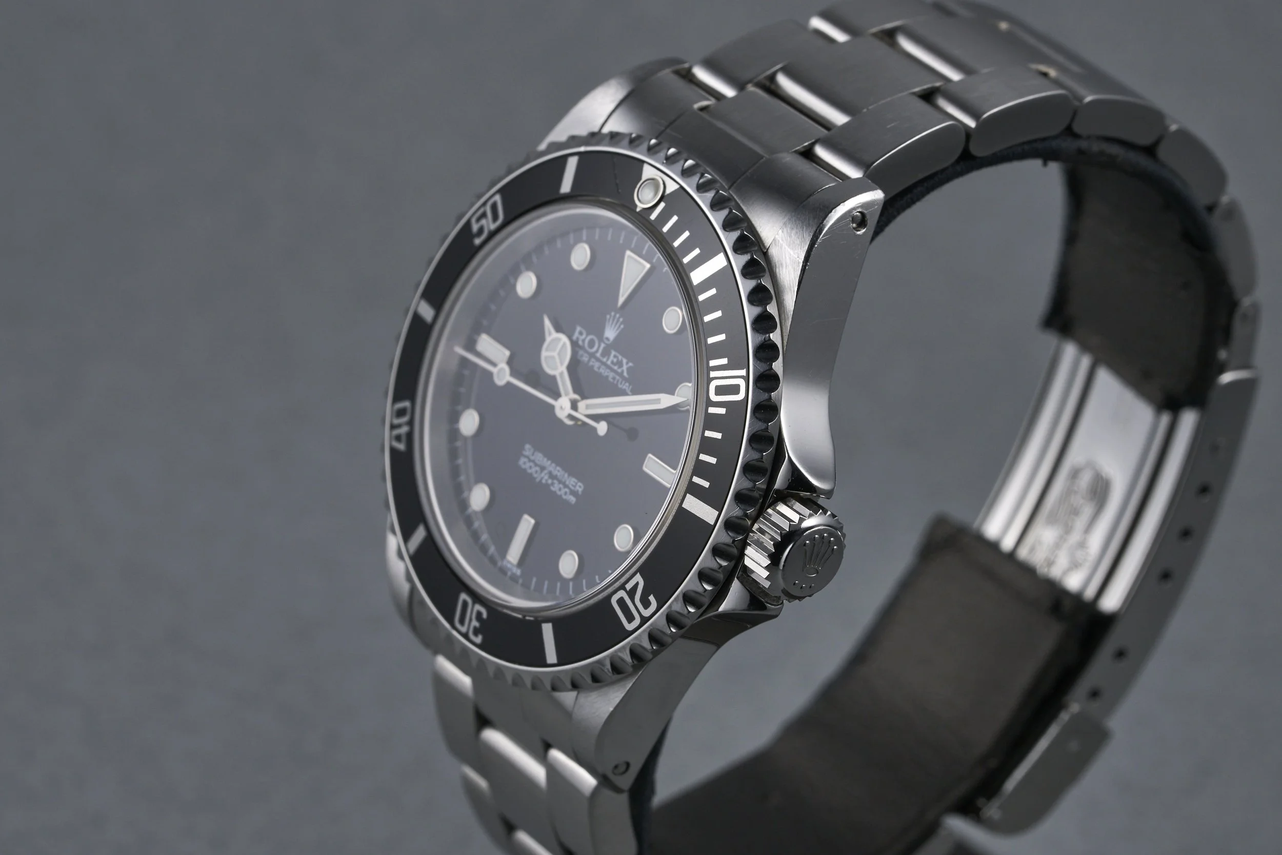 rolex-submariner-14060-swiss.only.dial-1999-oysterpalace-OP2287-06.jpg