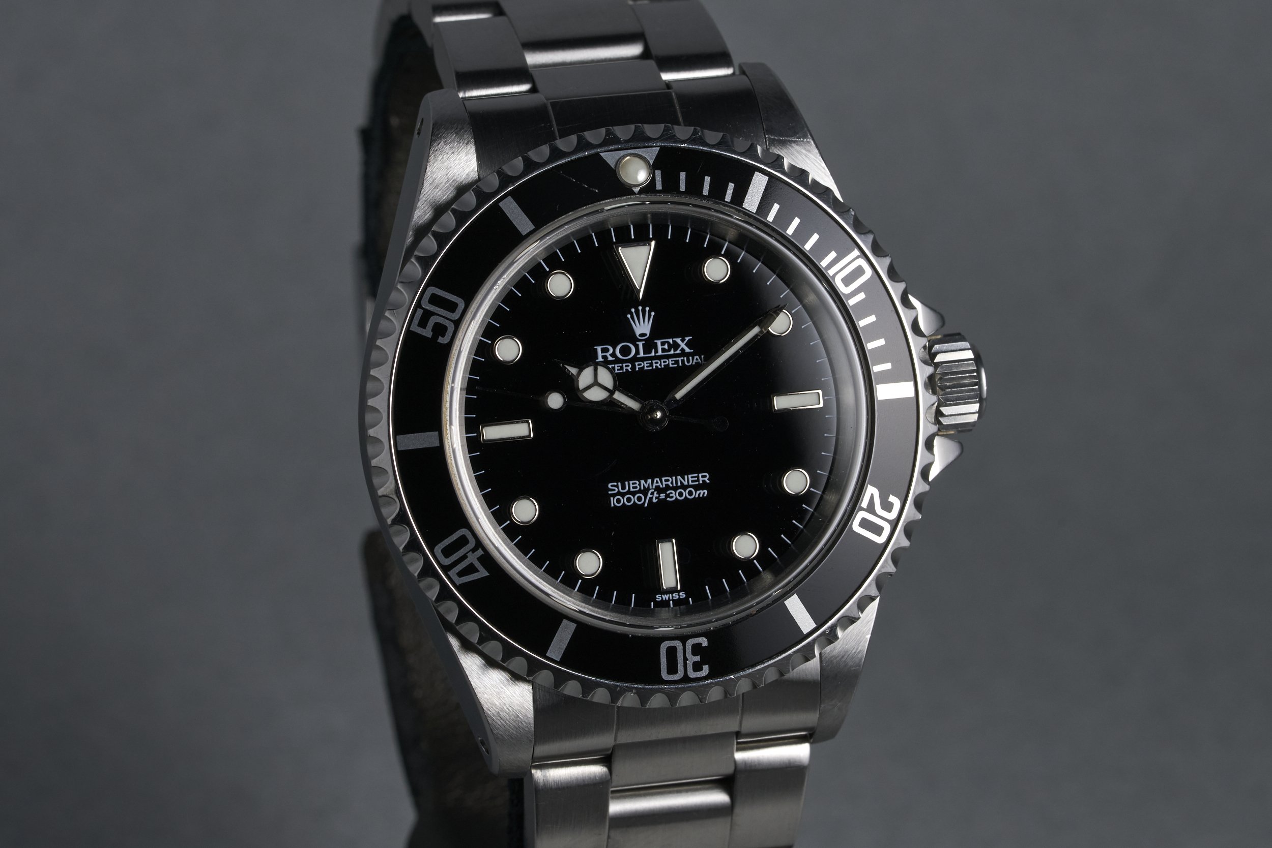 rolex-submariner-14060-swiss.only.dial-1999-oysterpalace-OP2287-02.jpg