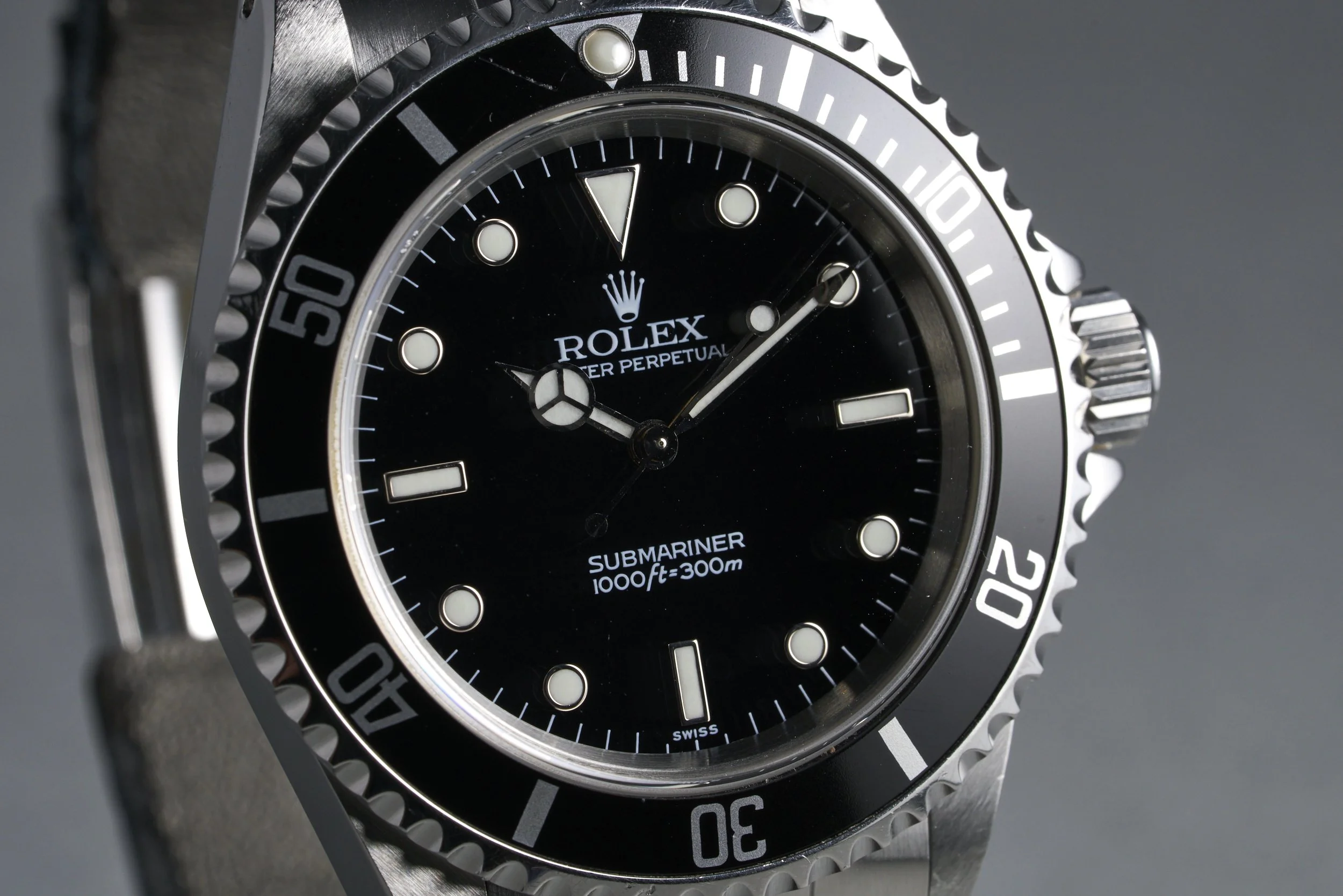 rolex-submariner-14060-swiss.only.dial-1999-oysterpalace-OP2287-04.jpg