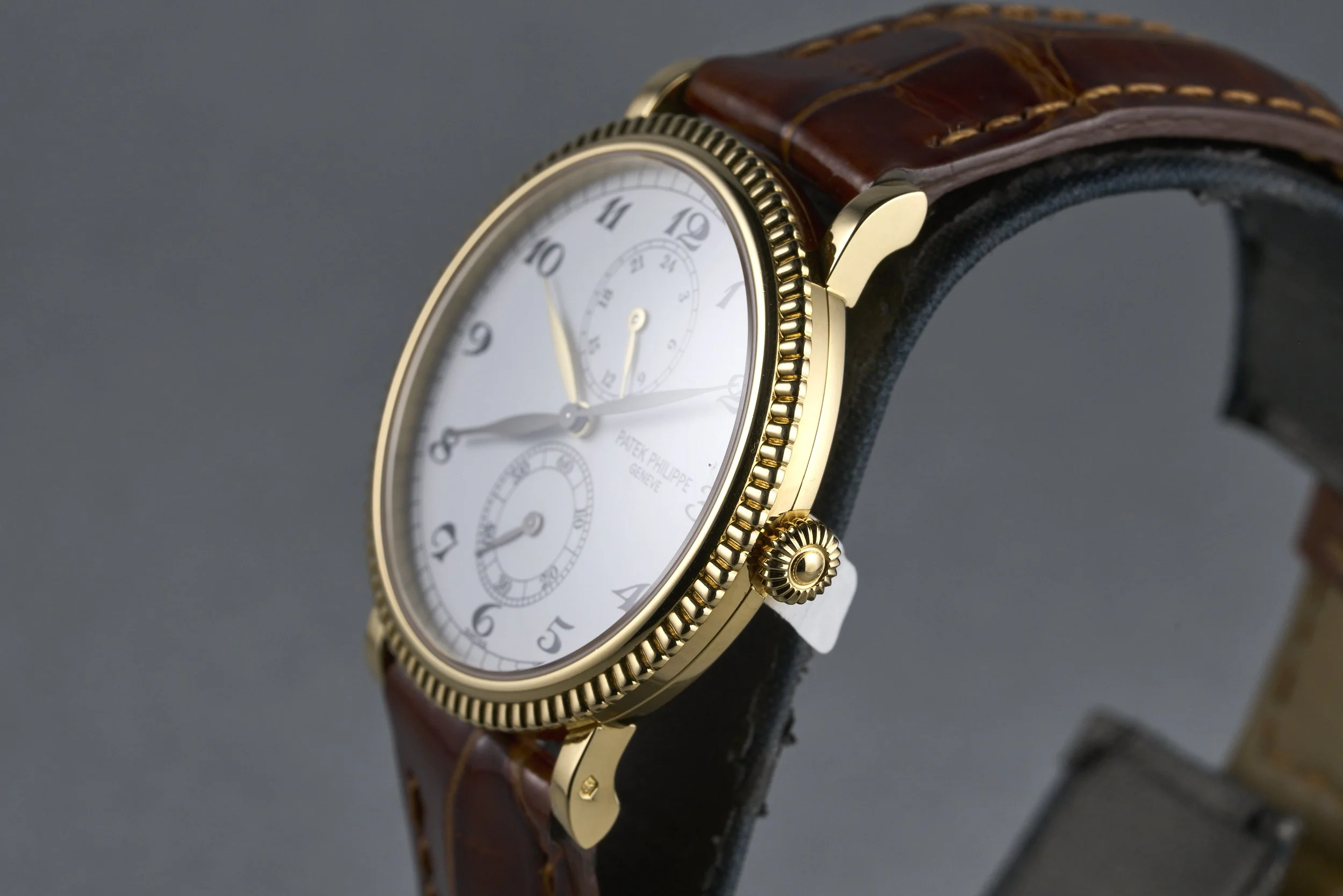 patekphilippe-traveltime.yellowgold.servicepapers-5034-white.roman.dial-2000s-oysterpalace-OP2207-07.jpg