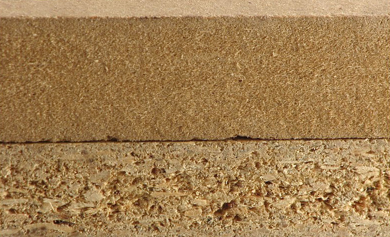 MDF is the board on top. Particle board is on bottom.