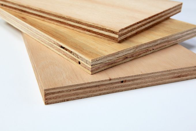 Plywood is thin layers of wood pressed and held together by an adhesive.