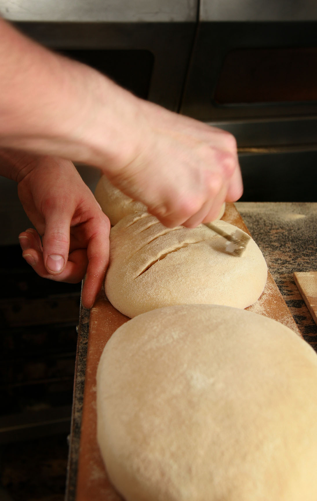 Bread being slashed