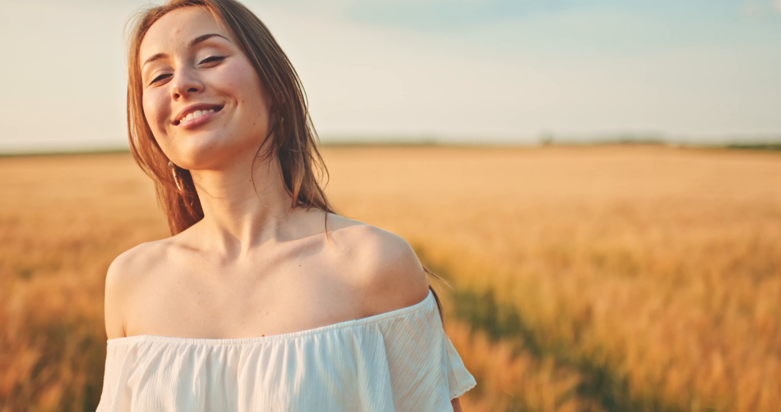 beautiful-girl-running-on-sunlit-wheat-field-slow-motion-120-fps-freedom-concept-happy-woman-having-fun-outdoors-in-a-wheat-field-on-sunset-or-sunrise-slowmo-harvest_4wzyqqe4il__F0000.png