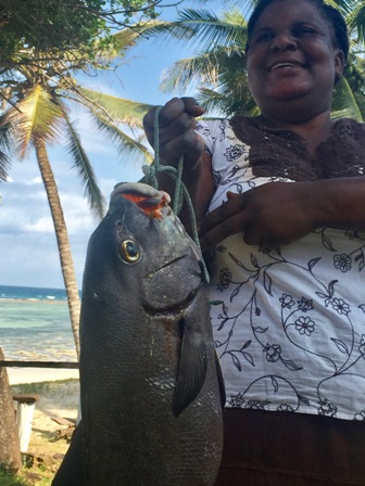 Eunice the Cook with Catch of the Day.jpg