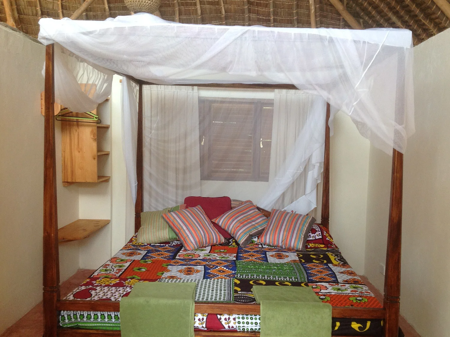 A Sand Island bed swathed in mosquito net